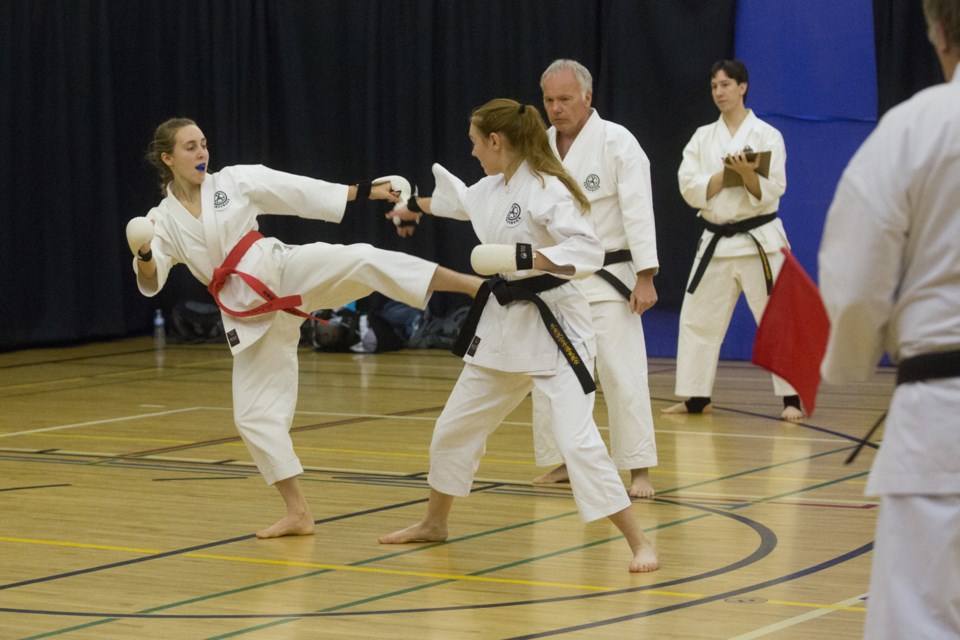 Gemma and Leah Page spar during a mini-tournanment on Jan. 28. The St. Paul Karate Do hosted a demonstration