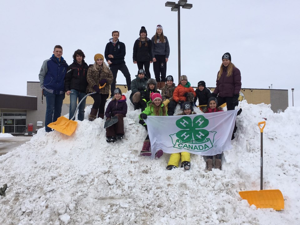 Members of the St. Paul 4-H club took the opportunity of last week&#8217;s big snowstorm to help out by shoveling. Residents were surprised on their return home to find their 