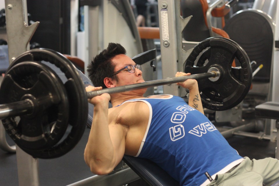 Jordan Duchesne works out at Peak Physique, late on a Sunday night. The 19-year-old&#8217;s dedication to improving his physique will see him competing at provincials and