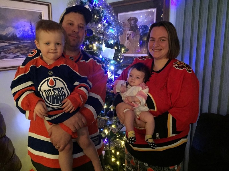 Andrew and Jody Looy might share many things as a married couple, but a love of the same hockey team is not one of them, with Andrew an Oilers fan and Jody a Flames fan,