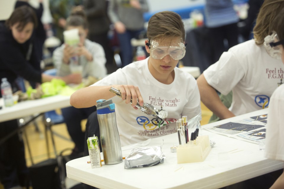 F.G. Miller Grade 9 student Hank Rogal works his way through the steps of a science challenge at last Friday&#8217;s St. Paul Education Regional Division&#8217;s Math and