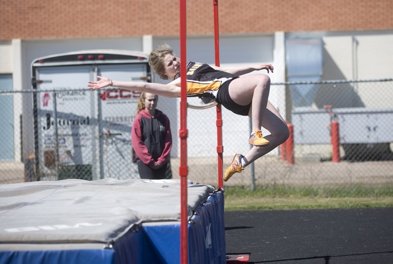 Students like Courtney Cole, pictured doing the high jump, showed off their athletic abilities during the May 17 SPAA track and field meet, held in St. Paul. Qualifying