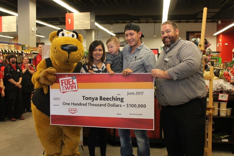 Federated Co-operatives Ltd.&#8217;s $100,000 grand prize winner from the 2017 Fuel Up to Win contest comes right from the local area, Elk Point. Tonya Beeching, Kyle Tingey