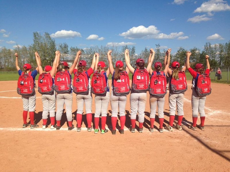 The St. Paul Storm Peewee girls show off their league championship back packs after winning a tournament in Bonnyville.