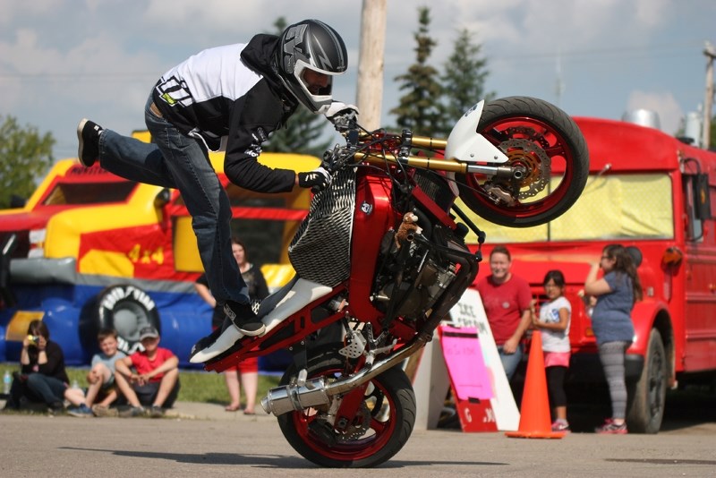 Stuntman Justin King kept the crowd on edge with his slick motorbike stunts during a show and shine in Ashmont, last weekend.