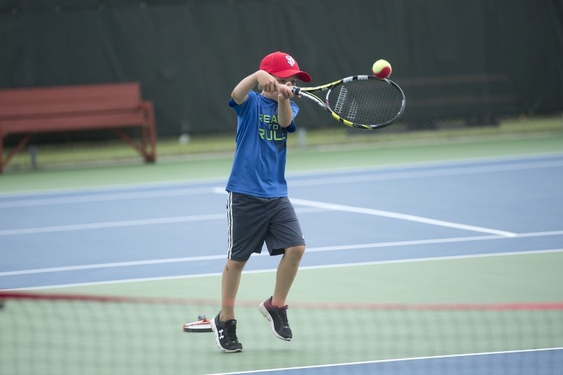 Cruz deMoissac won the A side of the tennis tournament last Friday for the kids enrolled in tennis lessons.