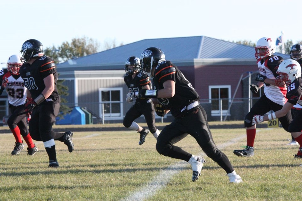 Lions player A.J Macdowell and his teammates had the visiting Westlock team going, as Macdowell ran the ball into the end zone on a trick play called the fumblerooski. The