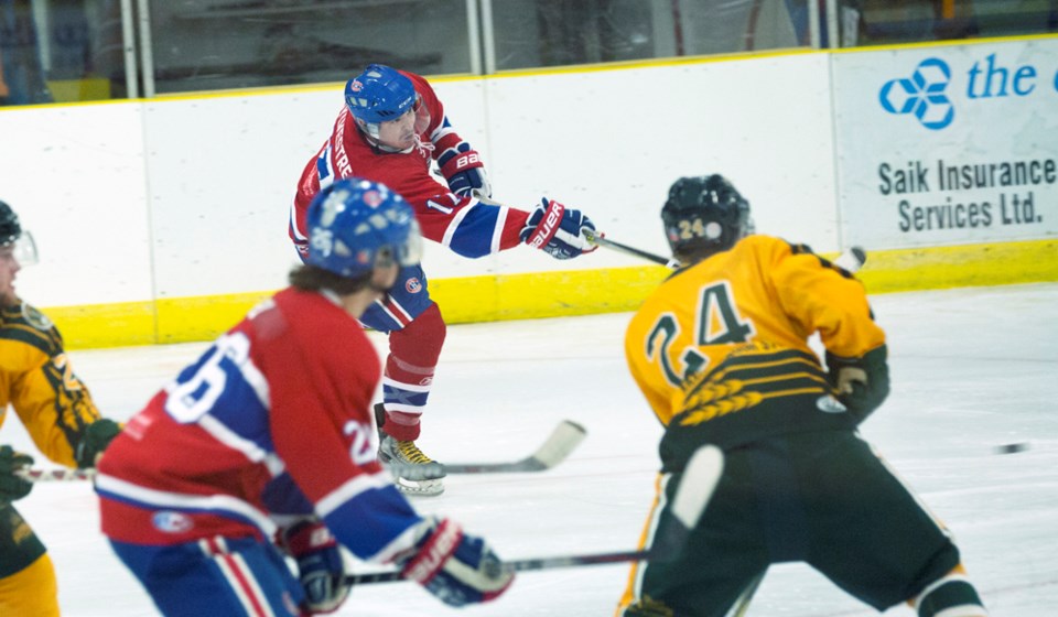 Zach Sylvester shoots toward the net during the Jr. B Canadiens&#8217; 4-1 win against the Killam Wheat Kings on Oct. 21. The Canadiens played the previous night at home