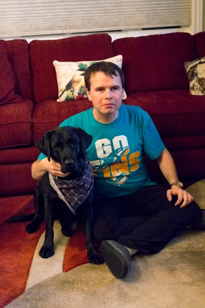 Colin Routhier and Panda can often be seen walking around town. Panda is a service dog, helping Colin get from place to place, safely.