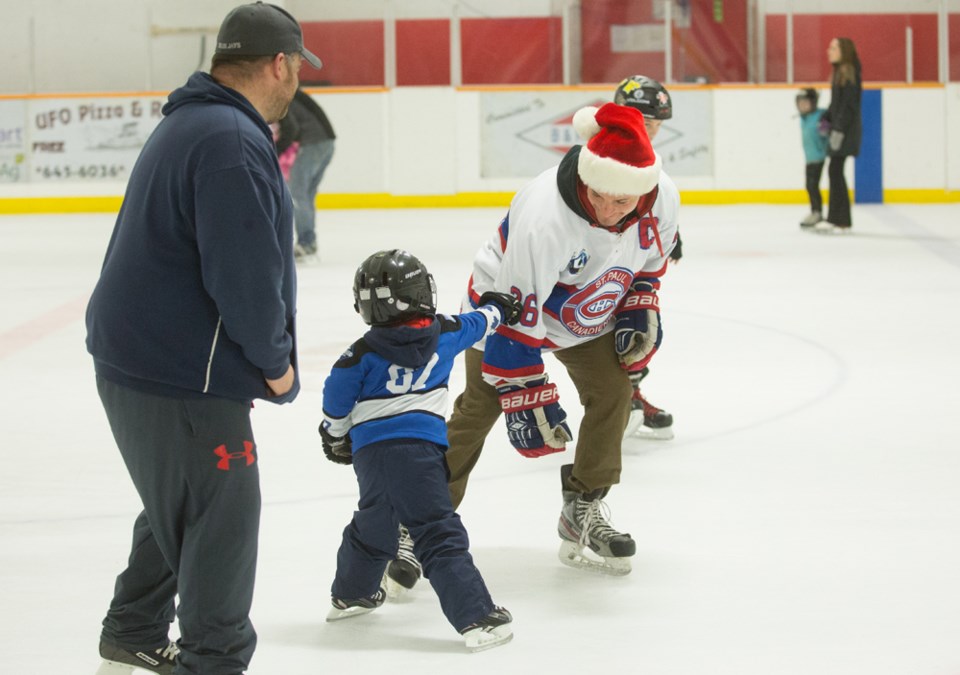 Jr. B Canadiens&#8217; player Dyson Roy plays tag with a young skating during the Dec. 16 Skate with Santa event. See this week&#8217;s Journal for more coverage of Christmas 