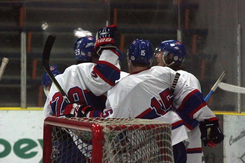 The Canadiens celebrate one of four goals scored over the Bandits on Jan. 6.