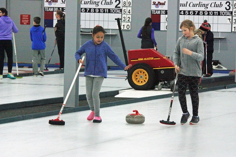 Junior curlers take part in the Jan. 28 curling event in St. Paul.