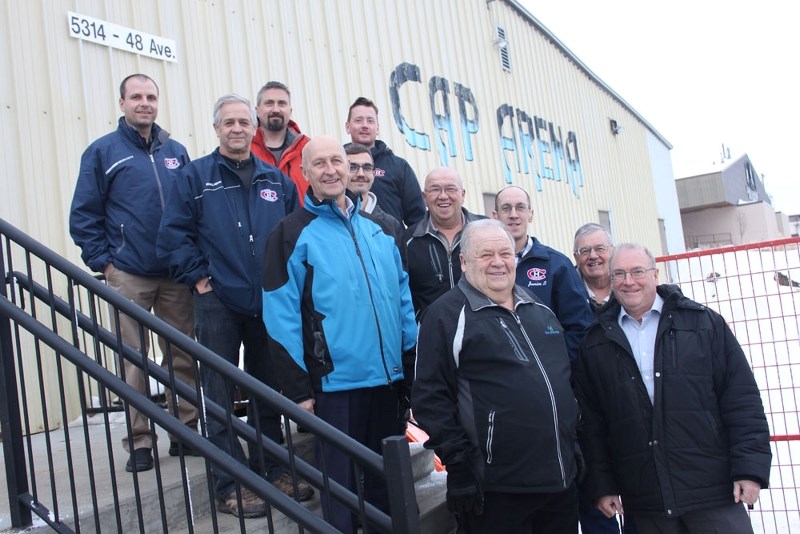 Pictured in front of the CAP Arena is: Ron Boisvert, Armand Boucher, Pierre deMoissac, PJ Dechaine, Paul Jean, Richard Jean, Maurice Joly, Danny Smyl, Jerry Wirsta, Jim