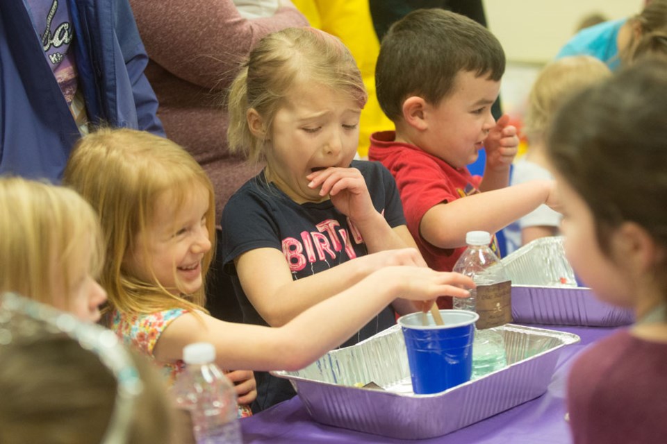 The Family Literacy Day celebration included more than just books at the St. Paul Municipal Library on Jan. 27. Children also enjoyed a few science experiments, such as this