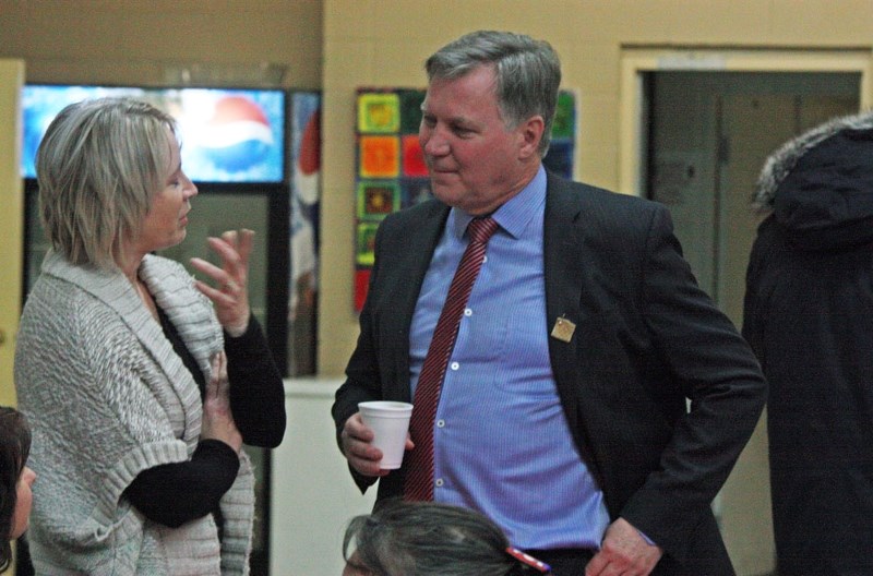 Minister of Indigenous Relations Richard Feehan chats with Chamber of Commerce manager Linda Sallstrom during a meet and greet at the Manawannis Native Friendship Centre on