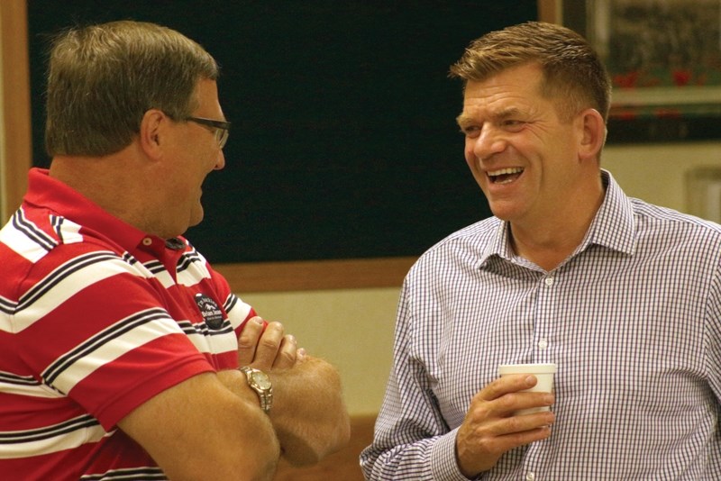 Former Wildrose leader Brian Jean (right) and Barrhead-Morinville-Westlock MLA Glenn van Dijken share a laugh during the 2017 Westlock Ag Fair breakfast. Jean, who&#8217;s