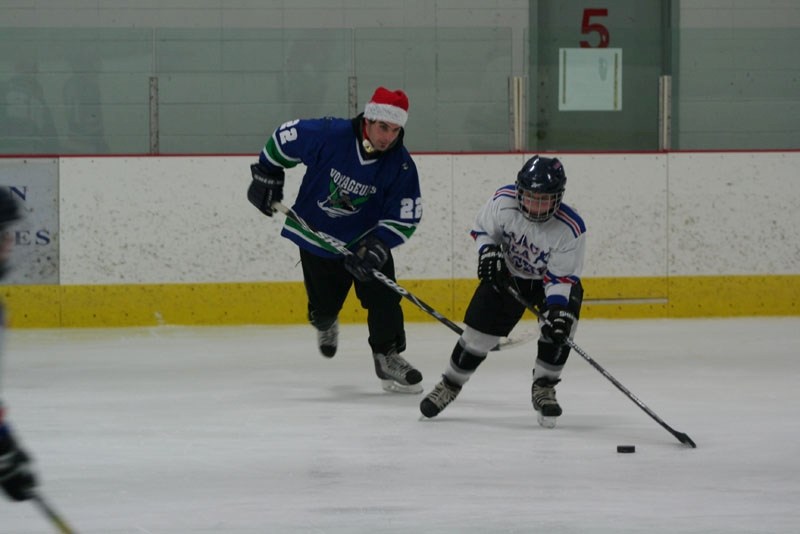 #22 Blair Hawes plays in a surprise Christmas fun scrimmage with the Atom Rangers on Dec. 13.