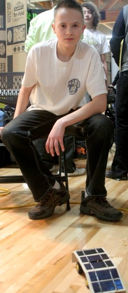 Ecole Plamondon student Jayden Ludington shows off his solar powered car that he made for the division science fair.