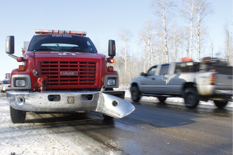 The front bumper of the Lac La Biche Fire Department&#8217;s pumper truck was twisted after a Dodge Ram clipped it at the scene of a rollover on Highway 881 near Conklin last 