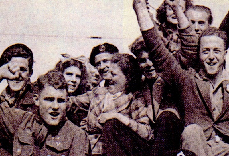Meyer (in the middle with a black hat) is at a liberation parade in Holland in 1945.