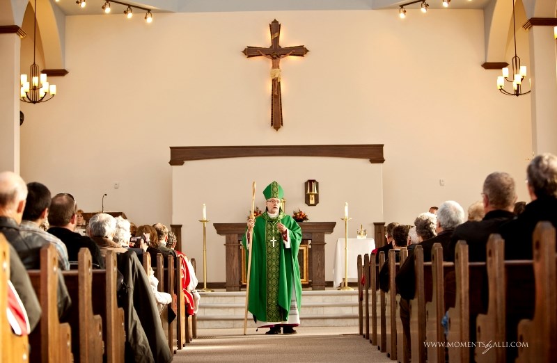 Reverand Luc Bourchard at St. Isidore Church in Plamondon Nov. 6.