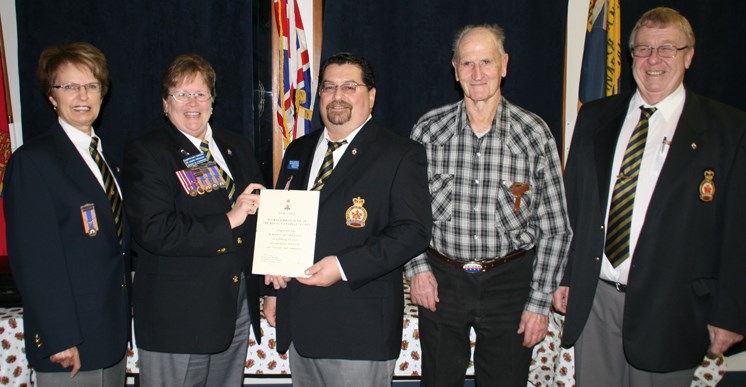 From left: Past Membership Chairman Leola Crossley, District Commander Audrey Ferguson, President Larry Lyons, WWII vet Glen Meyer, and Entertainment Chairman Bryon Heffner