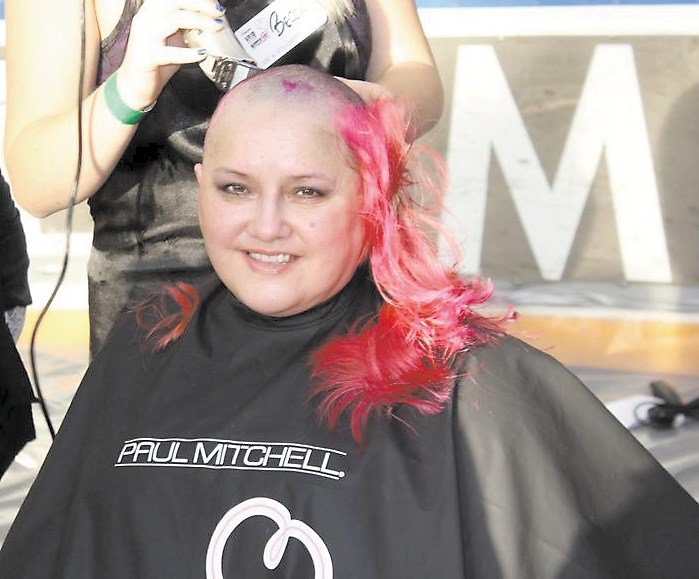 Betty Kennedy in Edmonton on Feb. 3 getting her hair shaved at West Edmonton Mall during the Hair Massacure event.