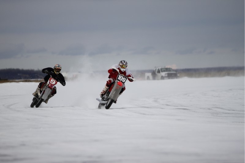 Matt Coonfer (right) and Monty Brown (left) battle for top spot on the oval ice course on Sunday.
