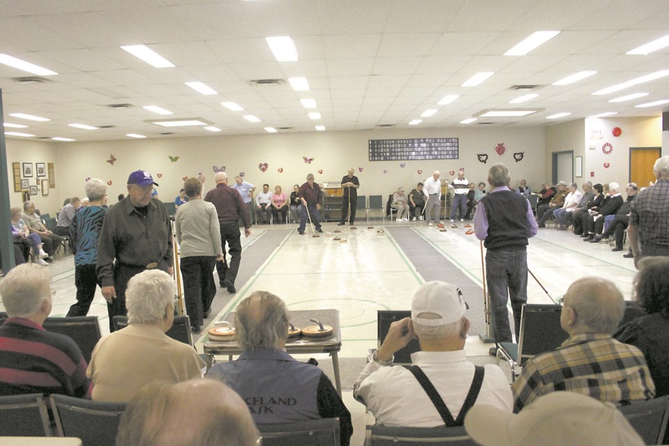 Floor curling draws a crowd at the local Heritage Centre. The indoor rinks will be even busier in August when seniors compete for the Lakeland Cup.