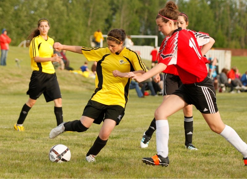 Miada Fayad shakes a defender as she advances the ball up field in a game against visiting Vegreville. The Lac La Biche girls won 4-3 in a thrilling last minute victory.