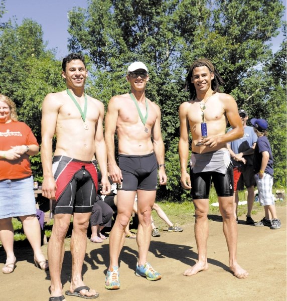 Keith Jackson (right) the winner of last year&#8217;s triathlon proudly holds his trophy. Will he attempt to keep his crown at this year&#8217;s biathlon?