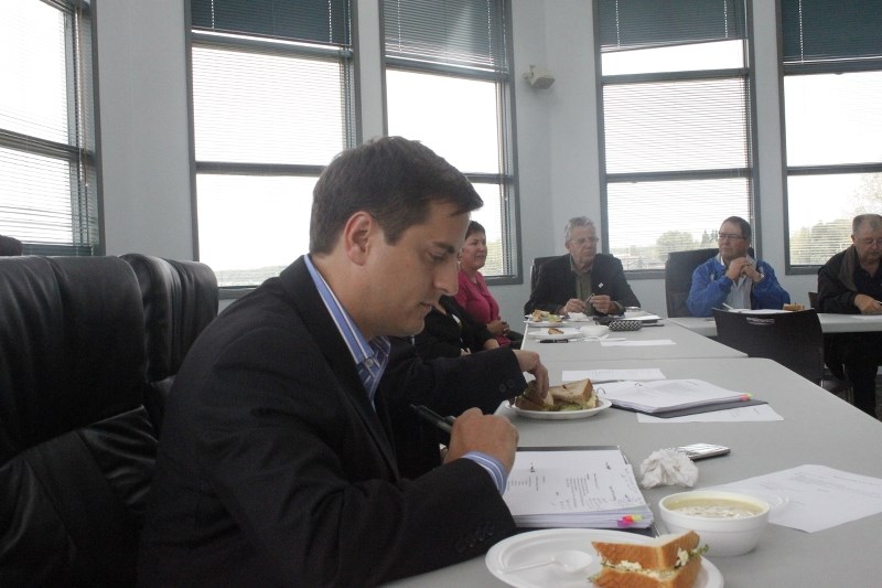 Lac La Biche Wildrose MLA Shayne Saskiw learns over lunch as he and Medicine Hat Wildrose MLA Drew Barnes gather information anc concerns on Hwy. 881 from Lac La Biche County 