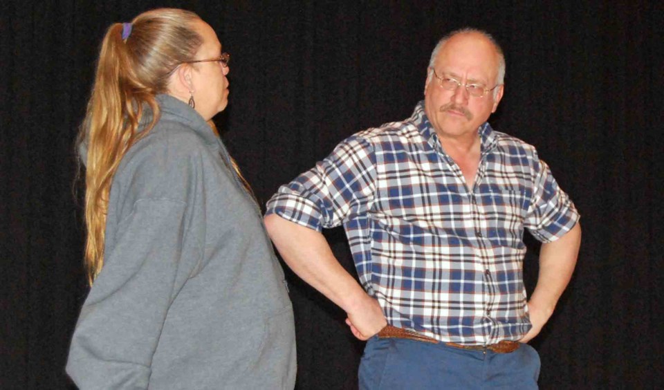 Jody Dayton and Ken Yakimec of the Lac La Biche Players rehearse a scene from their upcoming show &#8220;Homecoming&#8221;, which opens March 28.