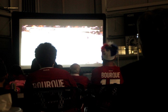 Members of the Bourque family watch Game 4 of the Canadiens&#8217; playoff series against the New York Rangers at a public viewing part in the Bold Center Sunday.