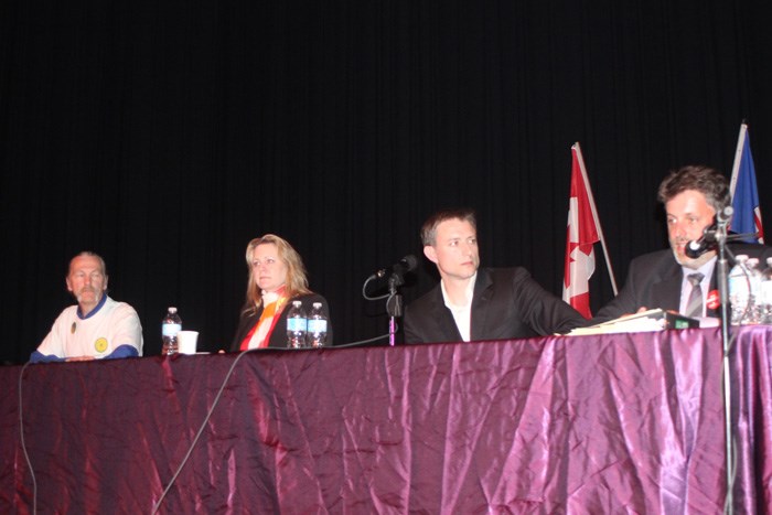 Federal by-election candidates Bryan Deheer (Green), Lori McDaniel (NDP), Tim Moen (Libertarian) and Kyle Harrietha (Liberal) at a debate in Lac La Biche June 12. Not