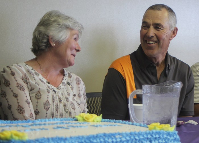 Randy Wowk and his wife Odile laugh after Randy was named Citizen of the Year July 31.
