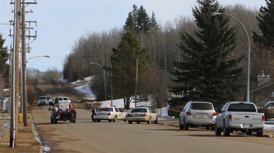 RCMP set up a perimeter near a residence they believed a person of interest to be.