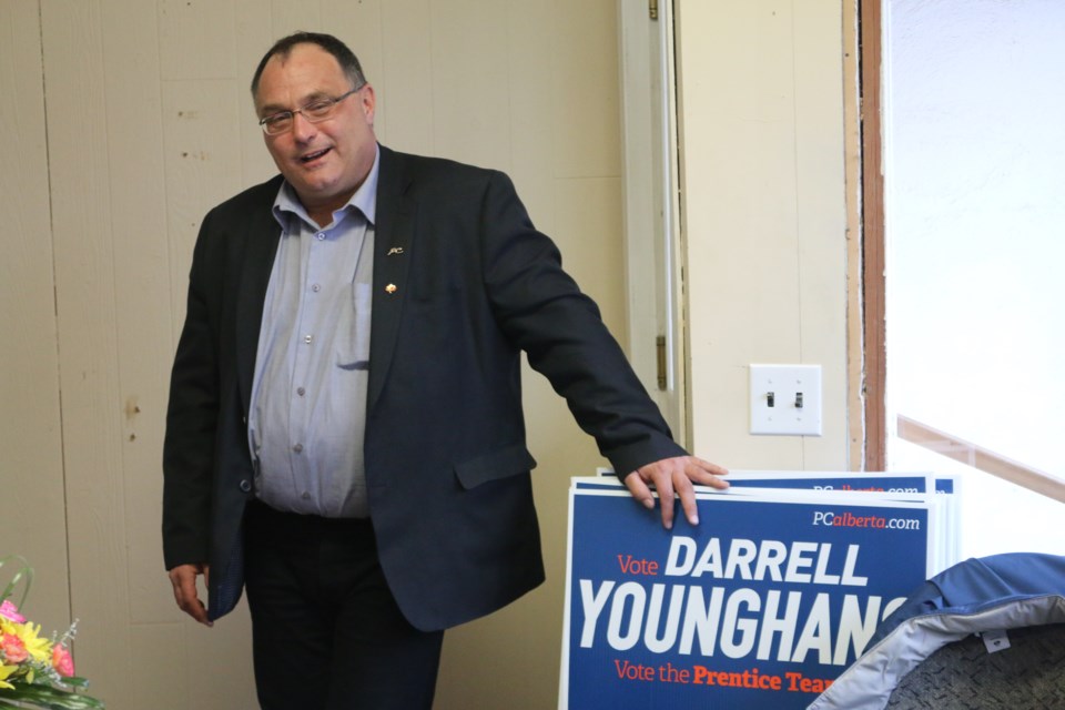 Darrell Younghans speaks to voters in his Lac La Biche campaign office