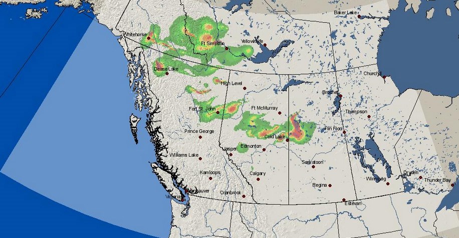 A smoke map shows smoke drifting west from the Cold Lake Air Weapons Range fire to the Lac La Biche area.