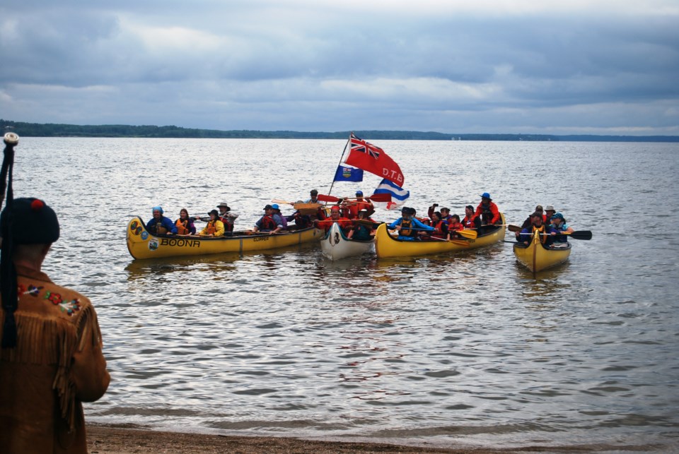 Four teams of modern-day voyageurs paddled from the Mission to McArthur Park beach on the weekend in the Portage La Biche Rendezvous.