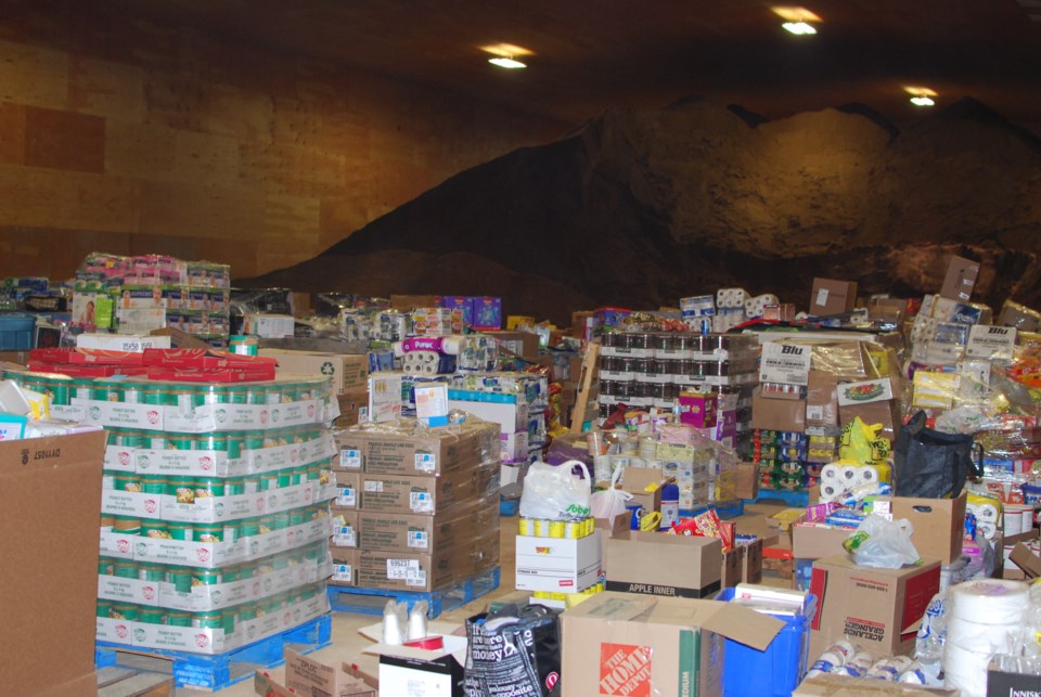Item donations are stockpiled in Lac La Biche County&#8217;s salt and sand shed.