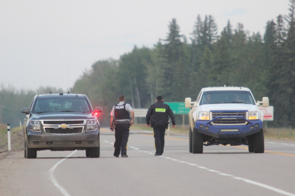RCMP set up a check stop on Highway 858 near Corner Gas in Lac La Biche Monday night while RCMP searched for the suspects (pictured vehicle was not implicated in