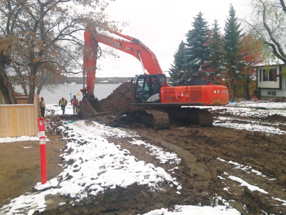 Workers were busy on Thanksgiving Monday with the ongoing construction job around Churchill Drive.