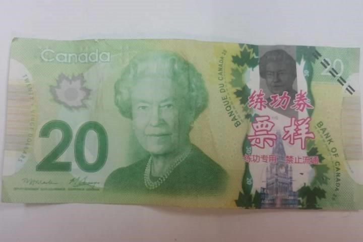 They are the same size and shape&#8230; but the big Chinese words are one telltale sign these notes are fake