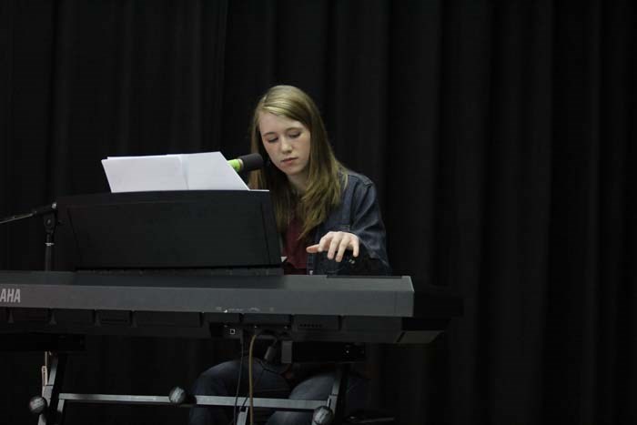  Elisha Chevigny with her solo performance while in the picture below three sisters Chantal Gauthier Vaillancourt, Danielle Gauthier and Desiree Gauthier perform