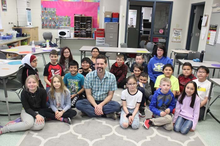  Jackie Routhier's class that won Wicker's beard bet as they achieved the highest average in a multiplication test. The class went on to vote for the Bat Moustache