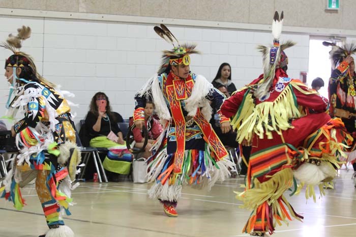  Saddle Lake students Waseskwan Quinn, Elijah Cardinal and Aidan Mcgilvery team up for the group dance