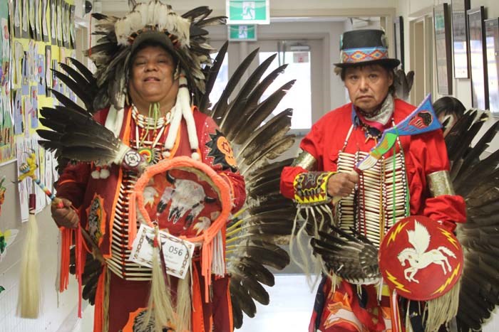  Gary Berland and Thomas Quinney from Frog Lake waiting in the school's hallway as they prep for their dance performance