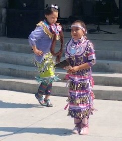  Macey Ann Candyline and Morning Star Alook enjoy jigging in their traditional dresses
