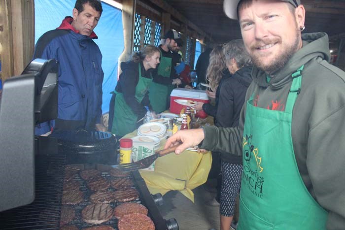  Tyler Yackimec with local Sand Springs Ranch was on the grill while Mayor Omer Moghrabi and MLA Laila Goodridge were busy making and serving burgers